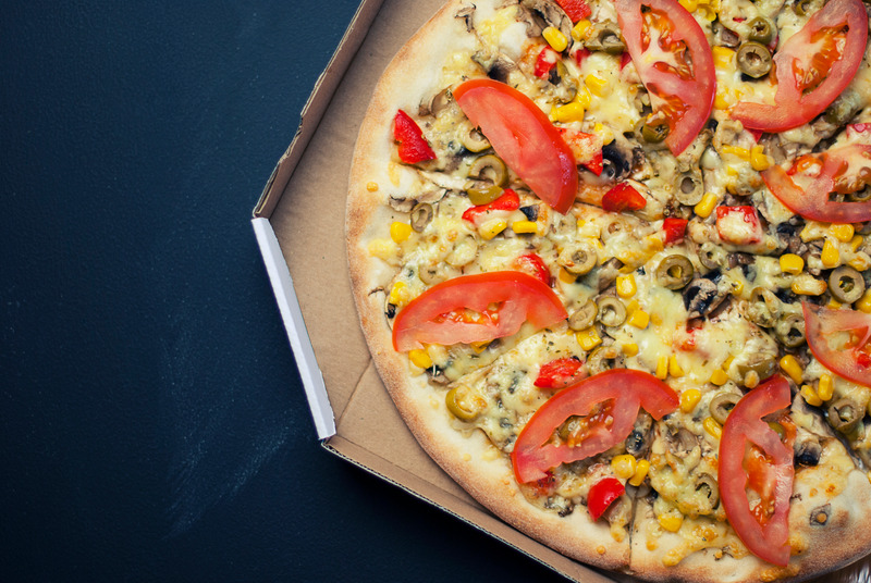 Canva - Pizza With Sliced Tomatoes on Brown Box